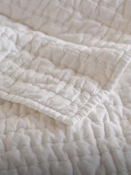 Textured white throw